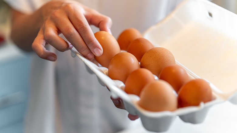 Woman holding eggs