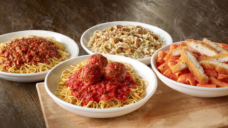 A variety of dishes from the Olive Garden showcase noodles and sauces