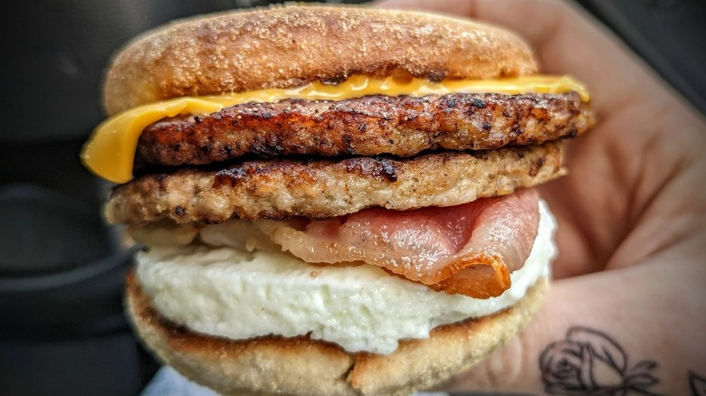 A hacked Triple Breakfast Stacks McMuffin with extra cheese, extra sausage, and bacon
