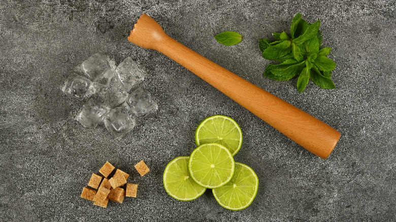 Muddler and ingredients for mojito