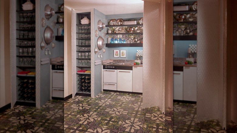 A 1970s kitchen with a patterned linoleum floor