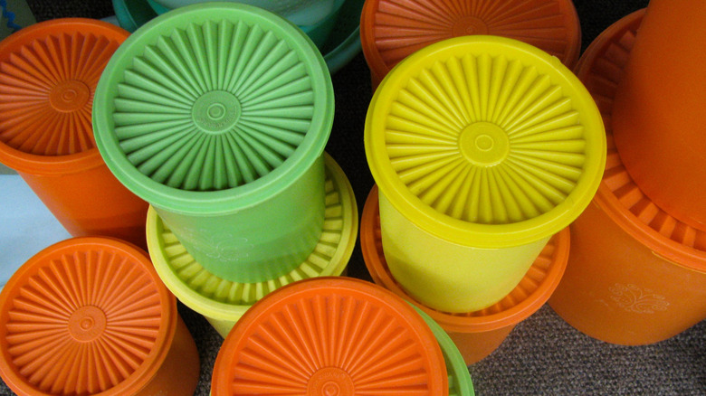 Orange, yellow, and green Tupperware