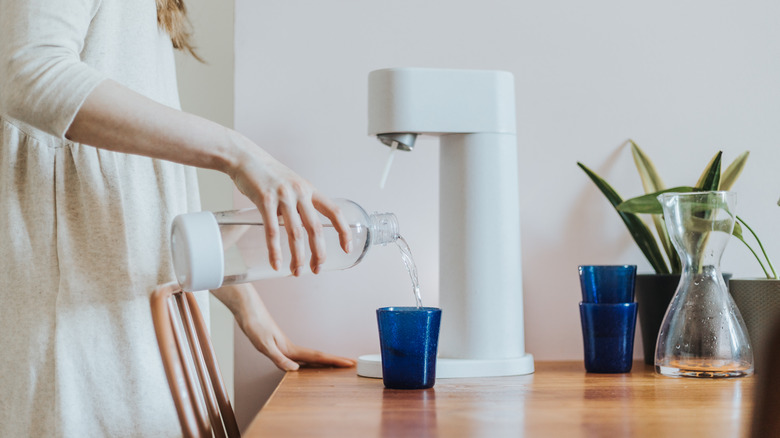 Pouring sparkling water