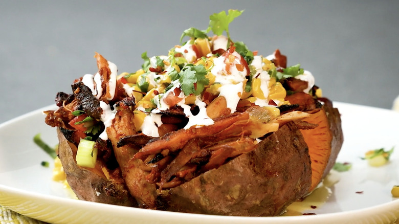 BBQ chicken-stuffed sweet potato with toppings