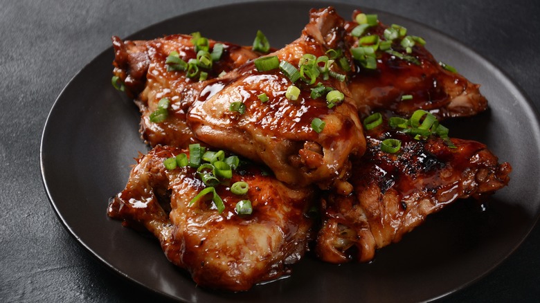 Filipino chicken thighs stewed in adobo sauce