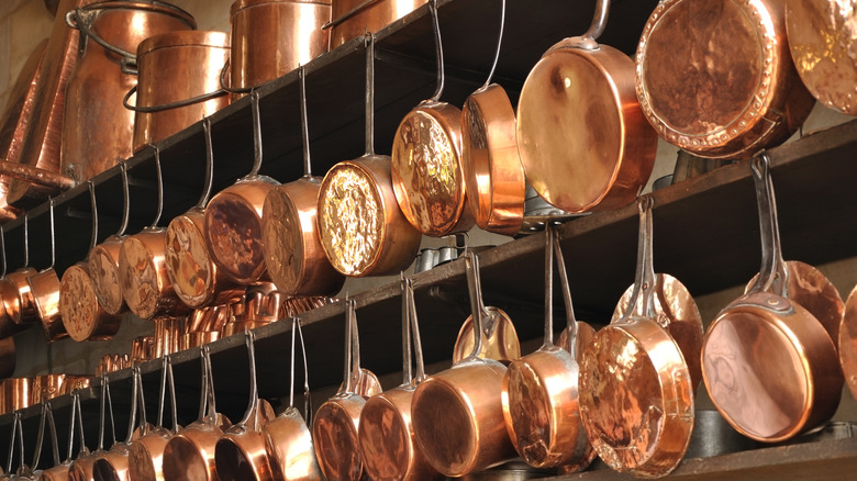 Copper cookware on display