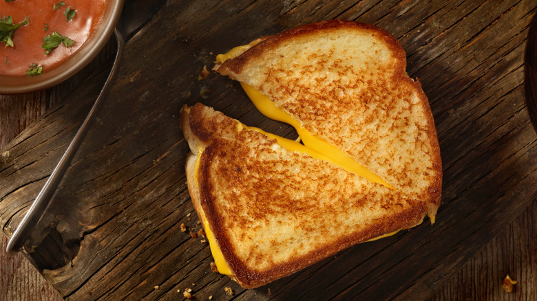 Grilled cheese sandwich on cutting board