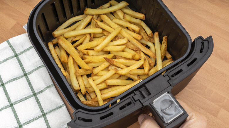 french fries in air fryer basket