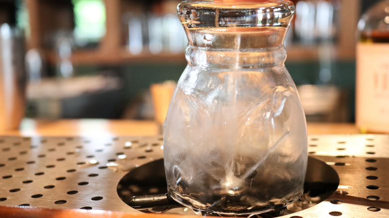 Cup on a glass rinser