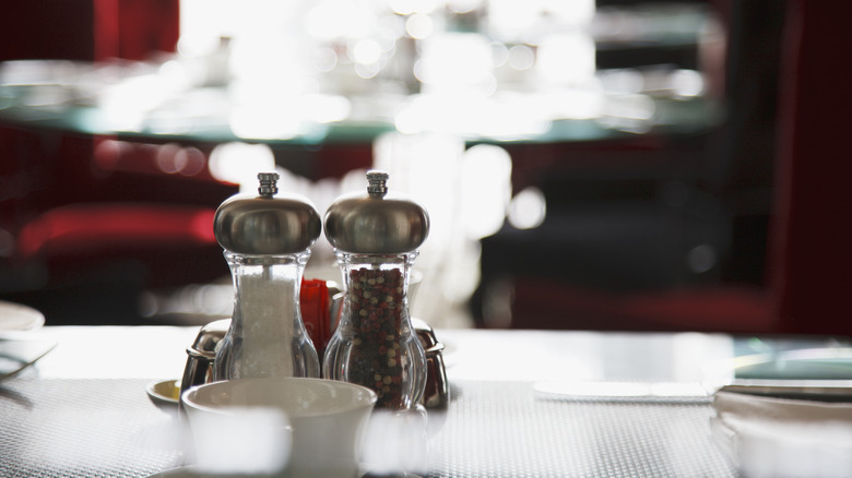 salt and pepper shakers on dining table