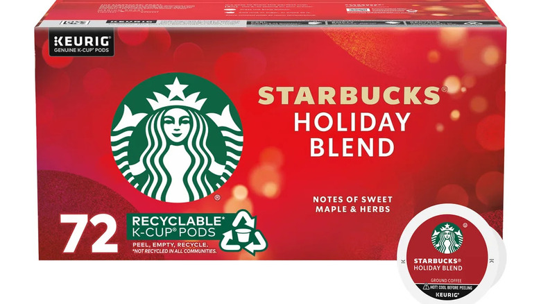 A box of Starbucks Holiday Blend coffee pods with a pod sitting beside it