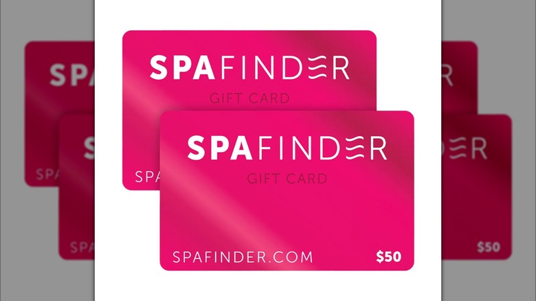 Two pink Spafinder gift cards