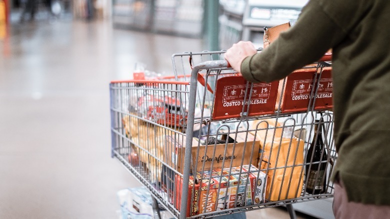 Shopper pushing cart at Costco Wholesale