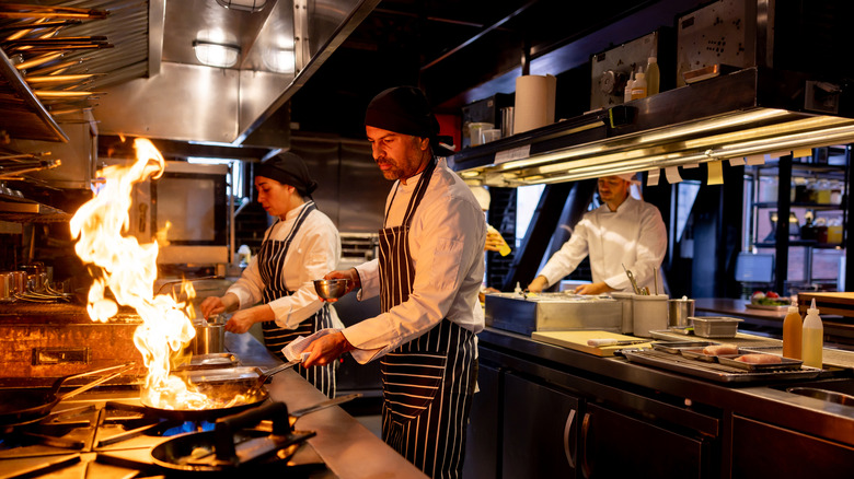 cooking food in restaurant kitchen