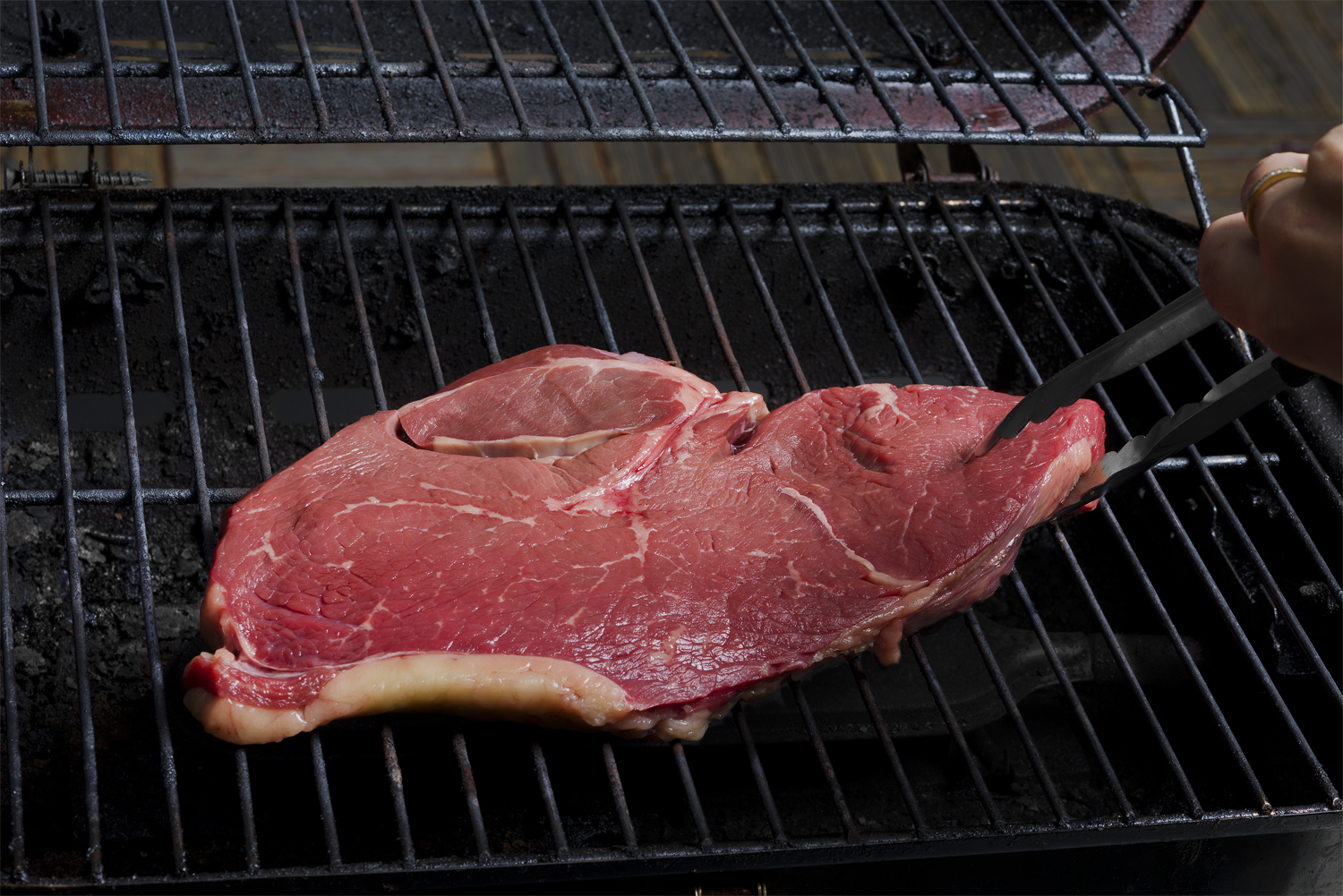 Place the steak on the grill