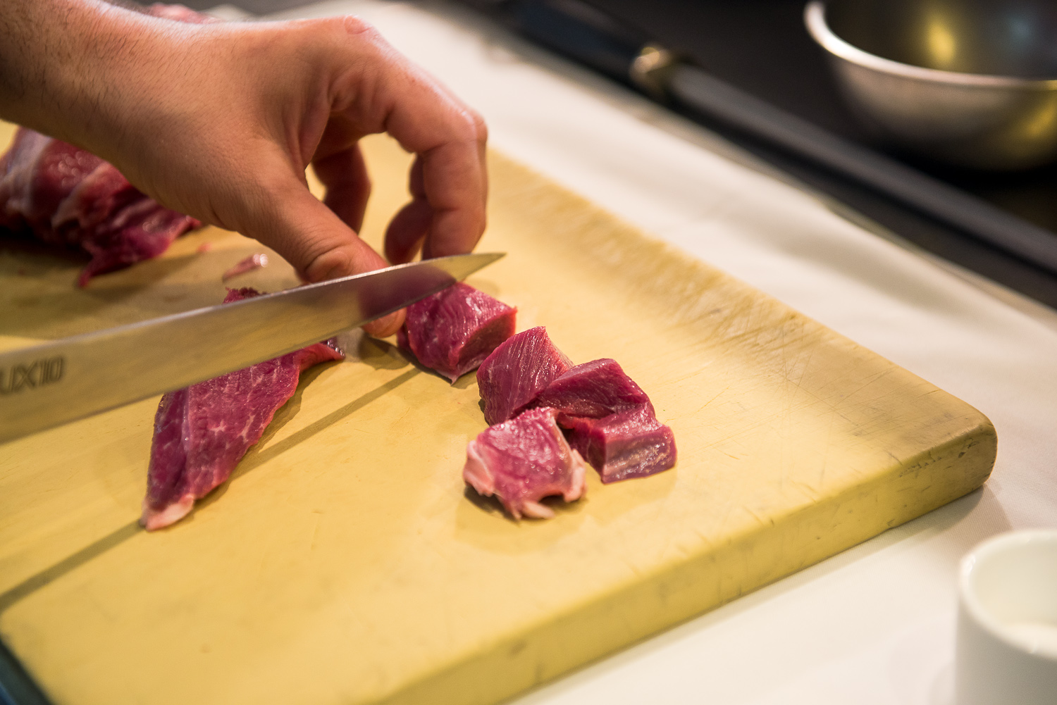 Cut the lamb into cubes