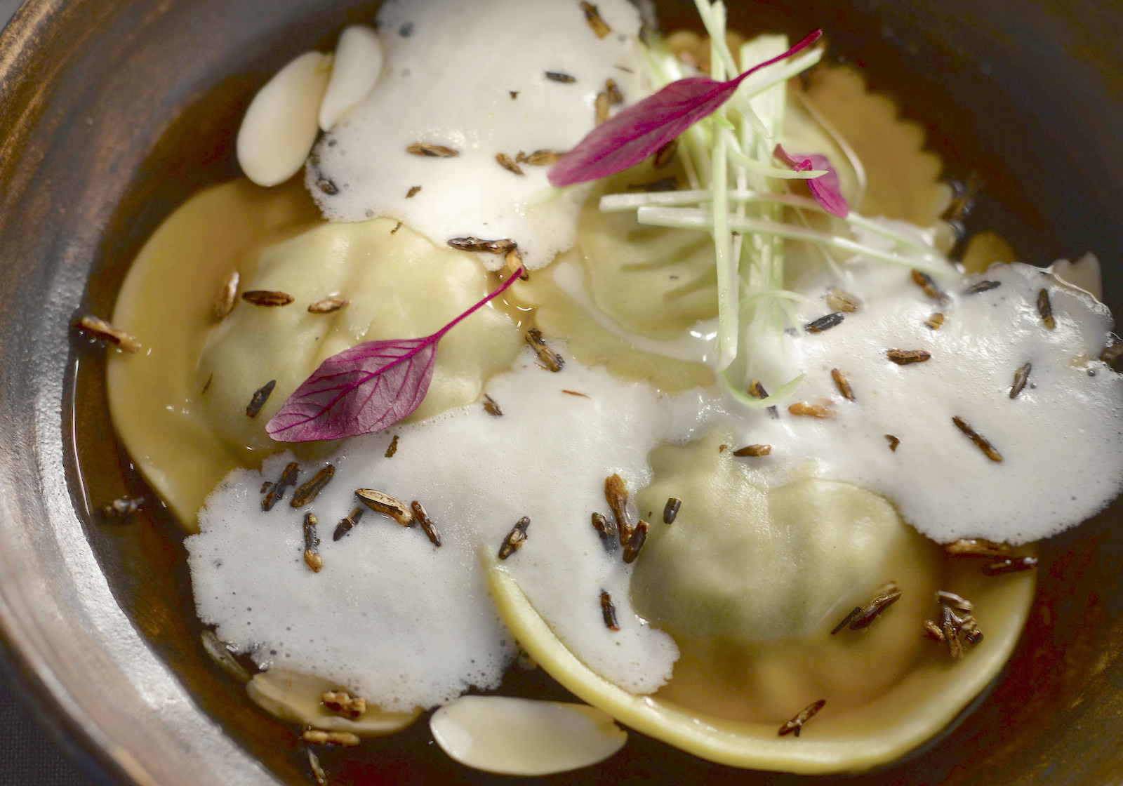 France Meets China Foie Gras Dumplings With Cilantro Beef Consommé