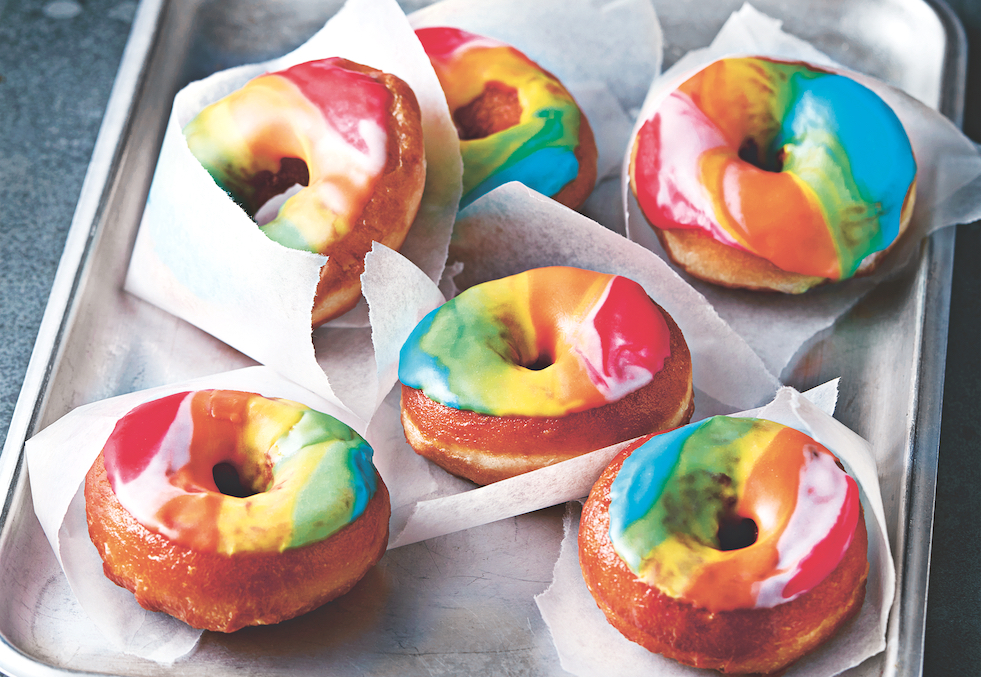Learn how to make these rainbow glazed doughnuts from scratch and prepare t...